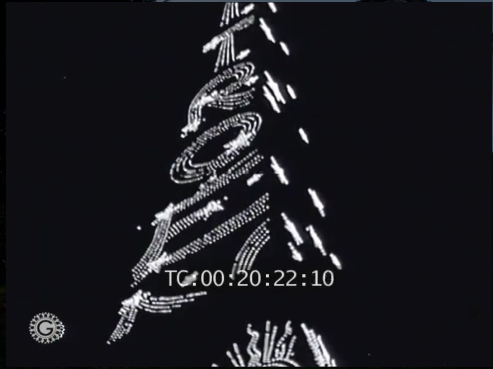 La Tour Eiffel Citroën illuminée la nuit, image d'un film d'archives Gaumont